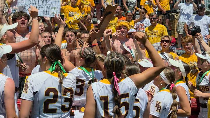 Kenton Ridge softball players celebrate with their fans after winning the OHSAA Division IV state title over Licking Valley on June 7, 2026 at Akron's Firestone Stadium. Kenton Ridge softball players celebrate with their fans after winning the OHSAA Division IV state title over Licking Valley on June 7, 2026 at Akron's Firestone Stadium.
