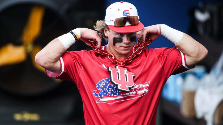 Indiana outfielder Carter Mathison wears the home run chain. Indiana outfielder Carter Mathison wears the home run chain.