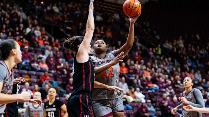 Feb. 20, 2025: Ramiya White (22) goes up against a stanford defender as the Virginia Tech Hokies play the Stanford Cardinals in an ACC match up in Blacksburg, Virginia at Cassell Coliseum