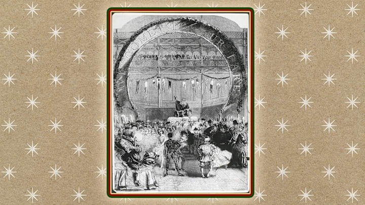 The Lord of Misrule overlooking Christmas revelry.