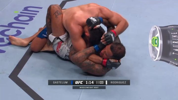 Kelvin Gastelum scores a takedown in round three of his UFC Fight Night clash with Daniel Rodriguez in Saudi Arabia.