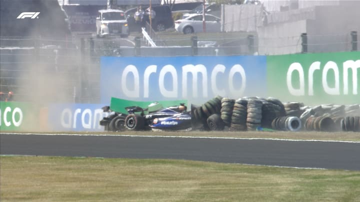 Alex Albon and Daniel Ricciardo come together at Turn 2 during the 2024 Japanese GP. Both drivers are out of their cars.