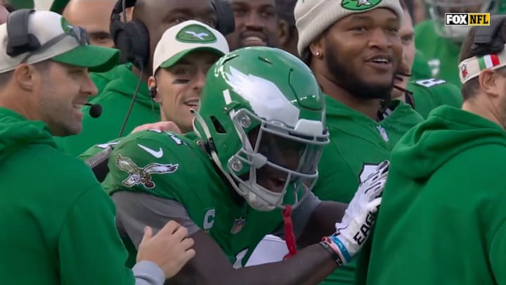 A.J. Brown reacts after realizing he threw away Tanner McKee’s first touchdown ball.