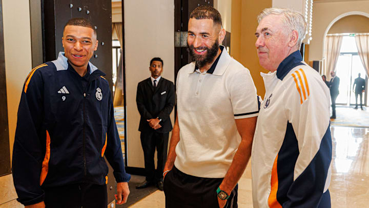 Karim Benzema (center) paid a visit to Real Madrid.