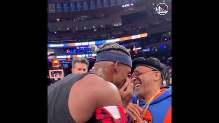 Jimmy Butler and Spike Lee share a moment after Knicks-Warriors game.
