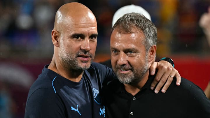 Hansi Flick (right) topped Pep Guardiola’s record in the Barcelona dugout.