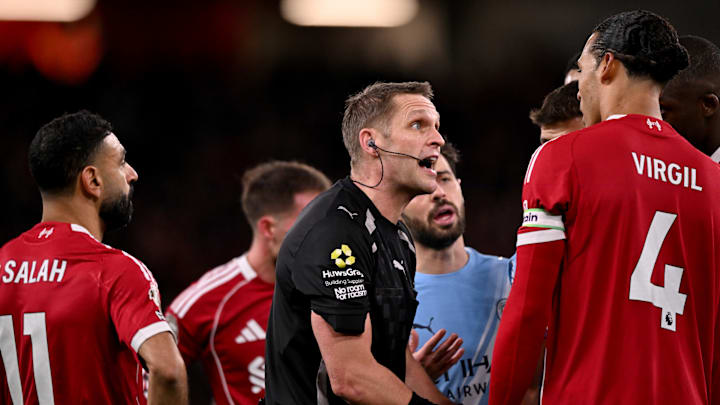 Referee Craig Pawson (centre) found himself under unwanted scrutiny.