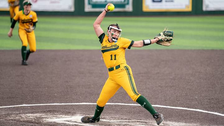 Right handed pitcher Hallie Burns delivers pitch for her former team, Southeastern Louisiana. Right handed pitcher Hallie Burns delivers pitch for her former team, Southeastern Louisiana.