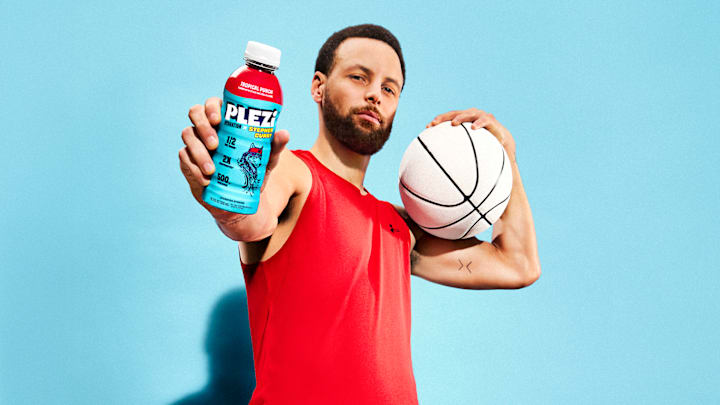 NBA star Stephen Curry shows off the Tropical Punch flavor of his new PLEZi Hydration drink. NBA star Stephen Curry shows off the Tropical Punch flavor of his new PLEZi Hydration drink.