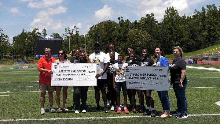 Ole Miss Legends DK and Terrence Metcalf alongside family presenting Annual Academic Scholarships to Lafayette and Oxford High Schools Ole Miss Legends DK and Terrence Metcalf alongside family presenting Annual Academic Scholarships to Lafayette and Oxford High Schools