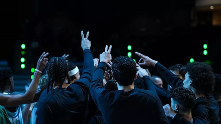 Tulane men's basketball team huddles together before a game Tulane men's basketball team huddles together before a game