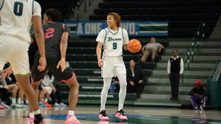 Tulane guard KJ Greene Looks to Pass Tulane guard KJ Greene Looks to Pass