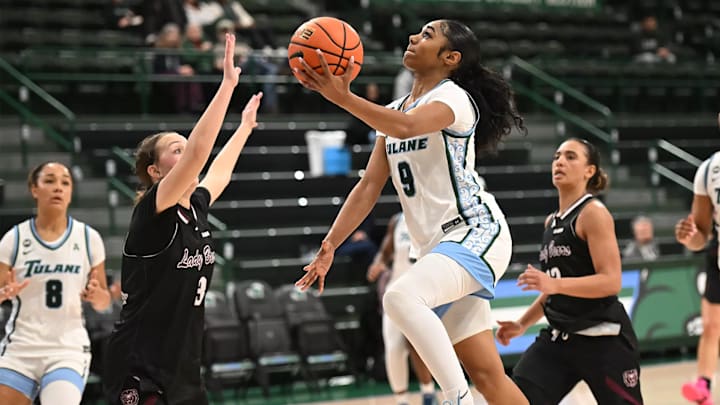 Tulane guard Kendall Sneed on a Layup Tulane guard Kendall Sneed on a Layup