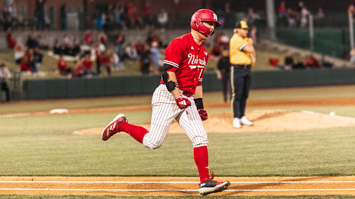 Nebraska designated hitter Max Buettenback rounds the bases after hitting a home run Wednesday night against Wichita State.