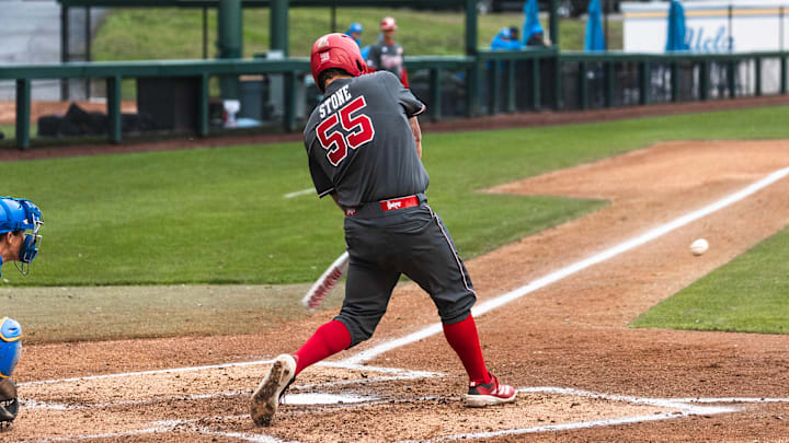 Nebraska designated hitter Tyler Stone swings at a pitch against UCLA. Nebraska designated hitter Tyler Stone swings at a pitch against UCLA.