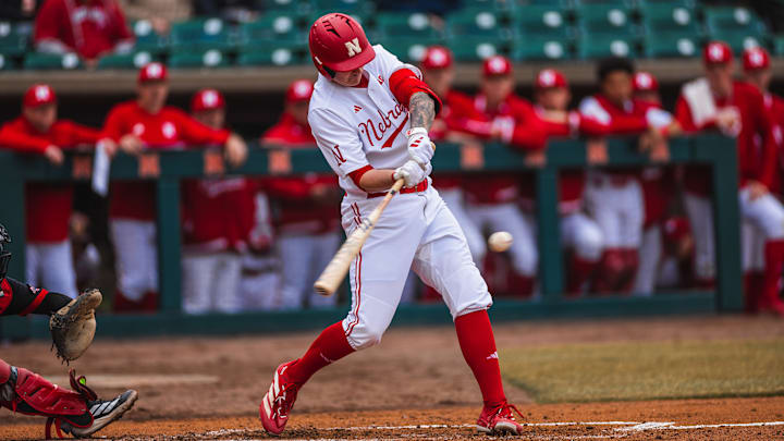 Nebraska designated hitter Cole Kitchens swings at a pitch from Omaha at Haymarket Park. Nebraska designated hitter Cole Kitchens swings at a pitch from Omaha at Haymarket Park.
