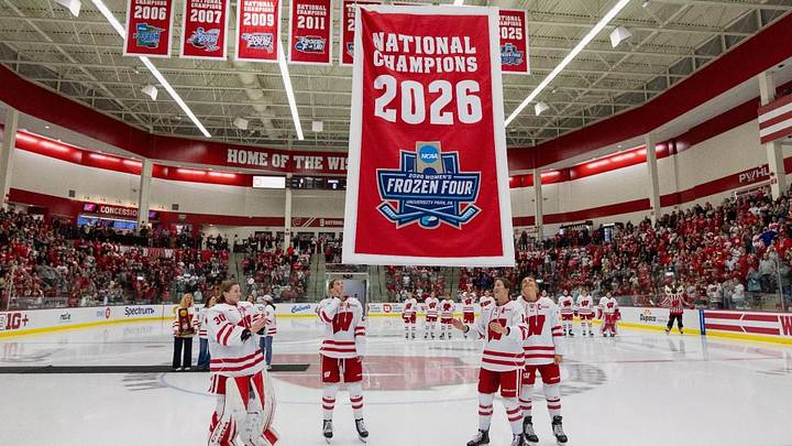 The Wisconsin women's hockey team raises its ninth national championship banner at LaBahn Arena. The Wisconsin women's hockey team raises its ninth national championship banner at LaBahn Arena.