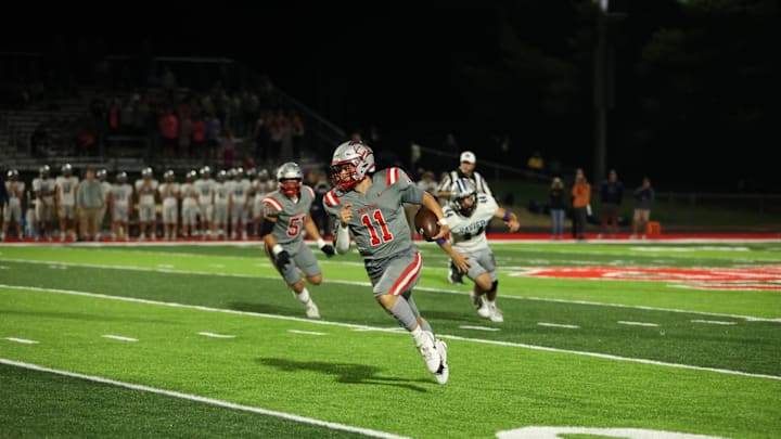 North Scott quarterback Chase Smith has his team in the Class 4A state quarterfinals as they take on Decorah this Friday night.
