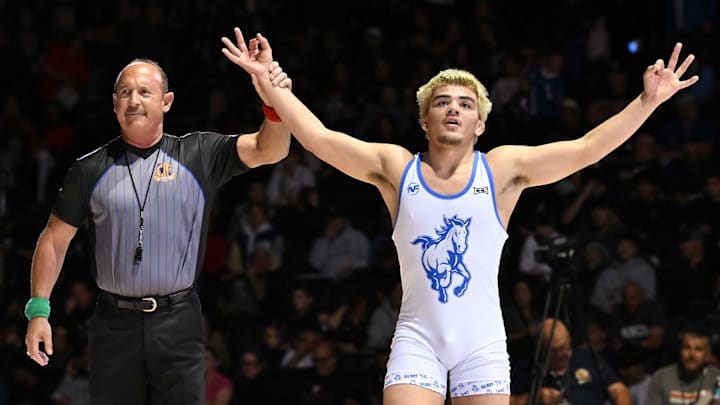 Daniel Zepeda of Glory celebrates winning the 150-pound weight title during the 2025 CIF State Wrestling Championships at Dignity Health Arena in Bakersfield (Calif.). 