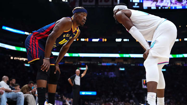 Jimmy Butler and Bam Adebayo look on during last night's game between the Heat and the Warriors. Jimmy Butler and Bam Adebayo look on during last night's game between the Heat and the Warriors.