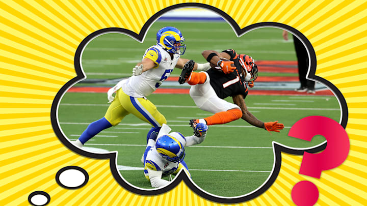 Ja’Marr Chase of the Cincinnati Bengals makes a catch over Raymond Calais of the Los Angeles Rams during Super Bowl LVI.