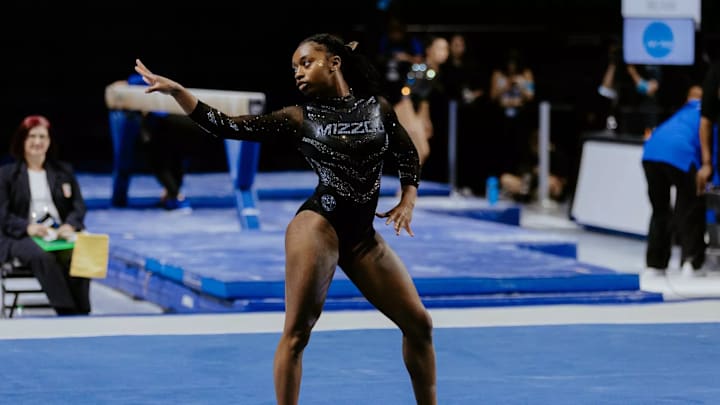 United States; Missouri gymnast Hannah Horton poses during her floor routine. United States; Missouri gymnast Hannah Horton poses during her floor routine.