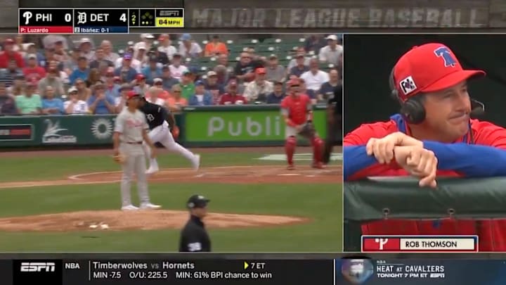 Rob Thomson watches a home run against the Phillies in spring training.