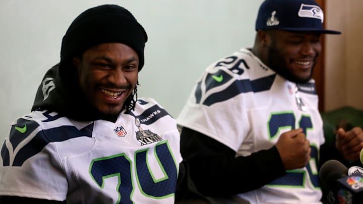 Marshawn Lynch and Michael Robinson