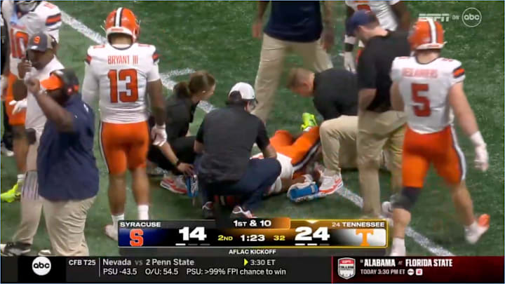 College football is working to crack down on players faking injuries, but it’s a tough problem to solve.