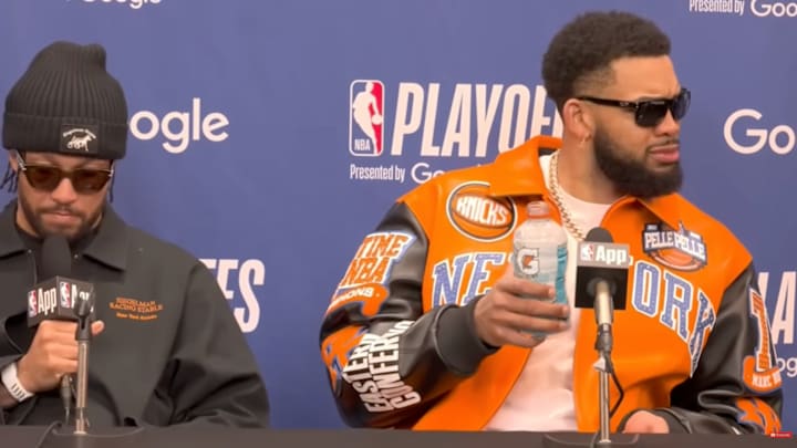 Karl-Anthony Towns reacts to a sip of Gatorade.