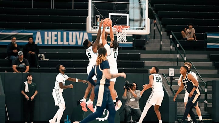 Tulane's Tyler Ringgold and Scotty Middleton Battle for a Board