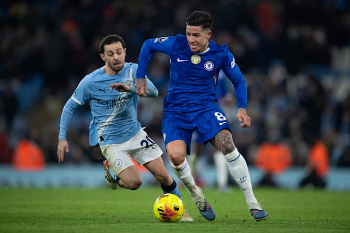 Enzo Fernández (right) holding off Bernardo Silva.