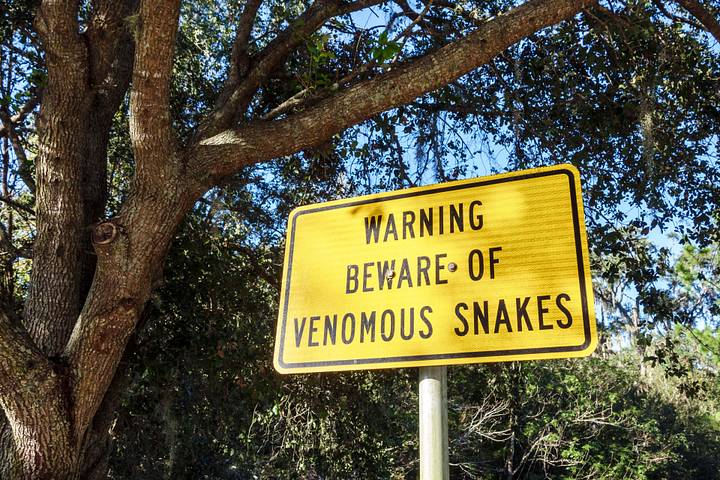 Snake beware sign.