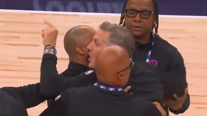 Chris Finch is seen screaming at an official after being ejected during the first quarter of Friday night's Wolves-Thunder game. 