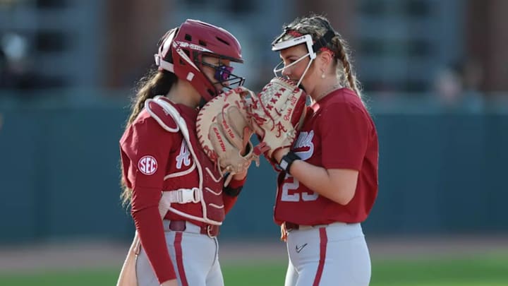 Alabama Softball Player Jocelyn Briski (23) Alabama Softball Player Marlie Giles (34) during game against Texas A&M at Davis Diamond in College Station, Tx on Saturday, Mar 22, 2025.