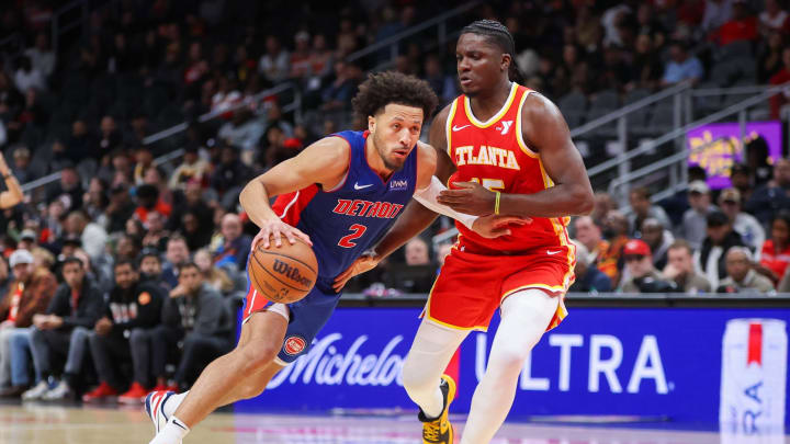 Dec 18, 2023; Atlanta, Georgia, USA; Detroit Pistons guard Cade Cunningham (2) drives past Atlanta