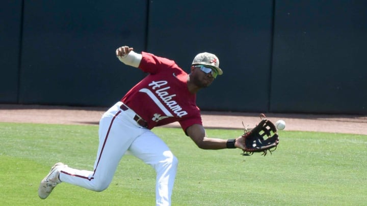 Alabama (and former Ole Miss) outfielder TJ McCants (44)