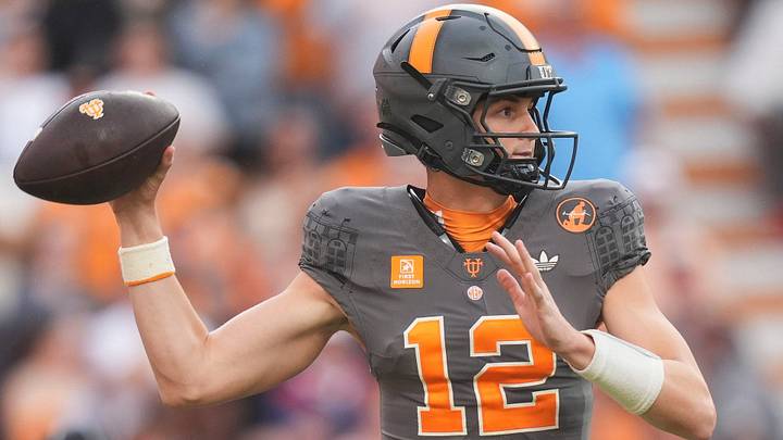 Tennessee quarterback George MacIntyre (12) throws a pass during a game between Tennessee and Auburn in Neyland Stadium in Knoxville, Tennessee, Oct. 3, 2026.