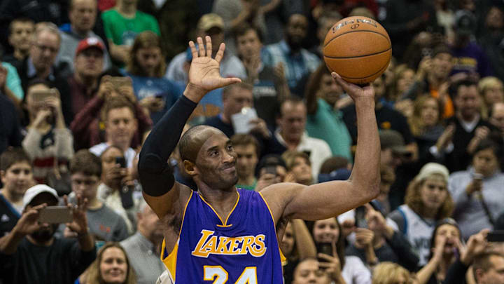 Dec 14, 2014; Minneapolis, MN, USA; Los Angeles Lakers guard Kobe Bryant (24) celebrates after surpassing Michael Jordan on the NBA All-Time Scoring List during the second quarter against the Minnesota Timberwolves at Target Center. Mandatory Credit: Brace Hemmelgarn-Imagn Images