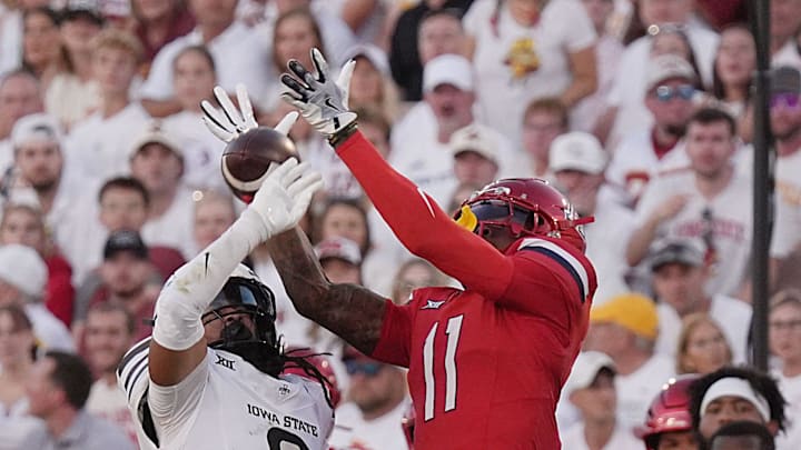 Iowa State Cyclones' defensive back Jamison Patton (2) breaks a pass from Arizona Wildcats wide receiver Chris Hunter (11) during the first quarter in the Big-12 conference showdown on Sept. 27, 2025, at Jack Trice Stadium in Ames, Iowa.
