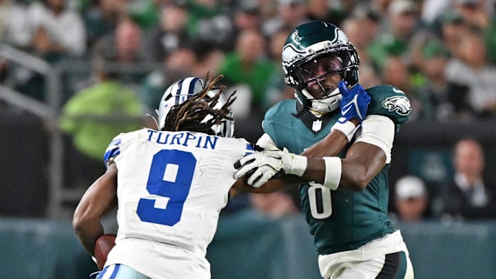Sep 4, 2025; Philadelphia, Pennsylvania, USA; Dallas Cowboys wide receiver KaVontae Turpin (9) pushes off against Philadelphia Eagles cornerback Adoree' Jackson (8) at Lincoln Financial Field. 