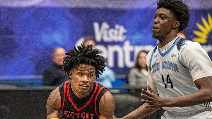 Victory Christian (1) Jozia Scott runs under basket by North Tampa Christian (14) Toni Bryant during the FHSAA 1A state semi final game at the RP Funding Center Tuesday February 25, 2025 in Lakeland Fl. Victory won 65-63 in 4 overtime periods.
Ernst Peters/The Ledger