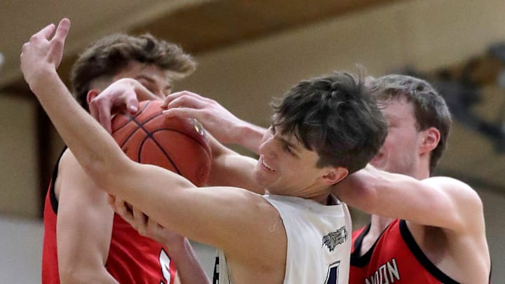 Xavier High School's Logan Ramczyk (1) against New London High School's Ryan Dalhoe (5) and Joseph Daly (24) during their boys basketball game in Appleton, Wisconsin on Monday, February 23, 2026. Xavier defeated New London 59-56.
Wm. Glasheen /USA TODAY NETWORK-Wisconsin Xavier High School's Logan Ramczyk (1) against New London High School's Ryan Dalhoe (5) and Joseph Daly (24) during their boys basketball game in Appleton, Wisconsin on Monday, February 23, 2026. Xavier defeated New London 59-56.
Wm. Glasheen /USA TODAY NETWORK-Wisconsin