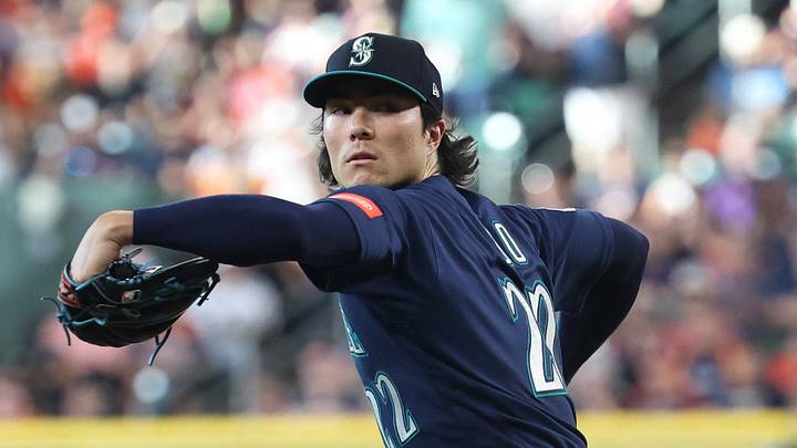 Aug 16, 2026; Houston, Texas, USA;  Seattle Mariners starting pitcher Bryan Woo (22) pitches against the Houston Astros in the first inning at Daikin Park. Mandatory Credit: Thomas Shea-Imagn Images