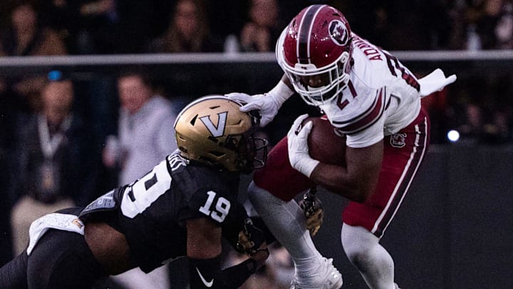Vanderbilt Commodores safety De'Rickey Wright (19) goes to stop South Carolina Gamecocks running back Oscar Adaway III (27) during the first half at FirstBank Stadium in Nashville, Tenn., Saturday, Nov. 9, 2024.