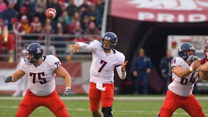 Arizona QB Willie Tuitama versus Washington State in a 59-28 win on the road in Pullman. Tuitama threw for 214 yards while going 11-of-14 with one passing touchdown and a rushing touchdown.