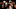 Paparazzi photographers and television reporters at celebrity event