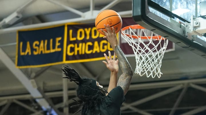 Stepinac's Boogie Fland (1) in action during their 73-52 win over St. Francis Prep in the CHSAA AA Intersectional semifinal basketball game at Fordam University in the Bronx. Stepinac's Boogie Fland (1) in action during their 73-52 win over St. Francis Prep in the CHSAA AA Intersectional semifinal basketball game at Fordam University in the Bronx.