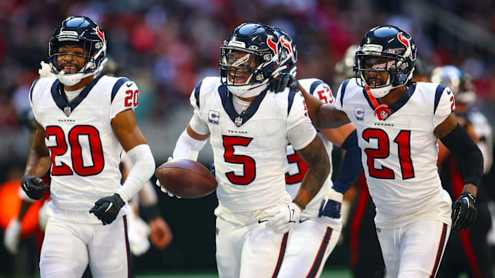 Oct 8, 2023; Atlanta, Georgia, USA; Houston Texans safety Jalen Pitre (5) celebrates with cornerback Ka'dar Hollman (20) and cornerback Steven Nelson (21) after a fumble recovery against the Atlanta Falcons in the second half at Mercedes-Benz Stadium. Mandatory Credit: Brett Davis-Imagn Images