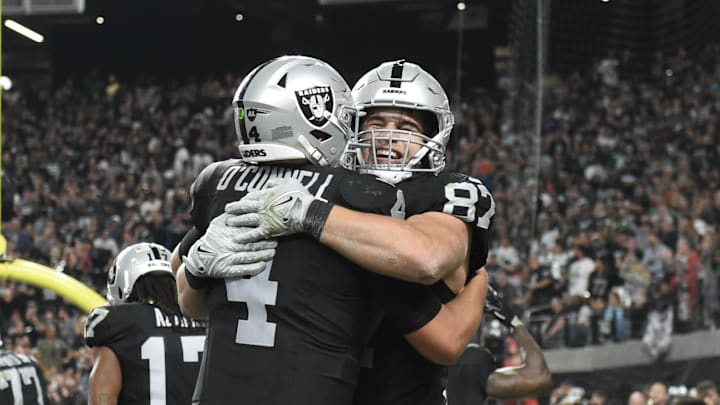 Nov 12, 2023; Paradise, Nevada, USA; Las Vegas Raiders tight end Michael Mayer (87) celebrates his fourth-quarter touchdown with quarterback Aidan O'Connell (4) against the New York Jets at Allegiant Stadium. Mandatory Credit: Candice Ward-USA TODAY Sports